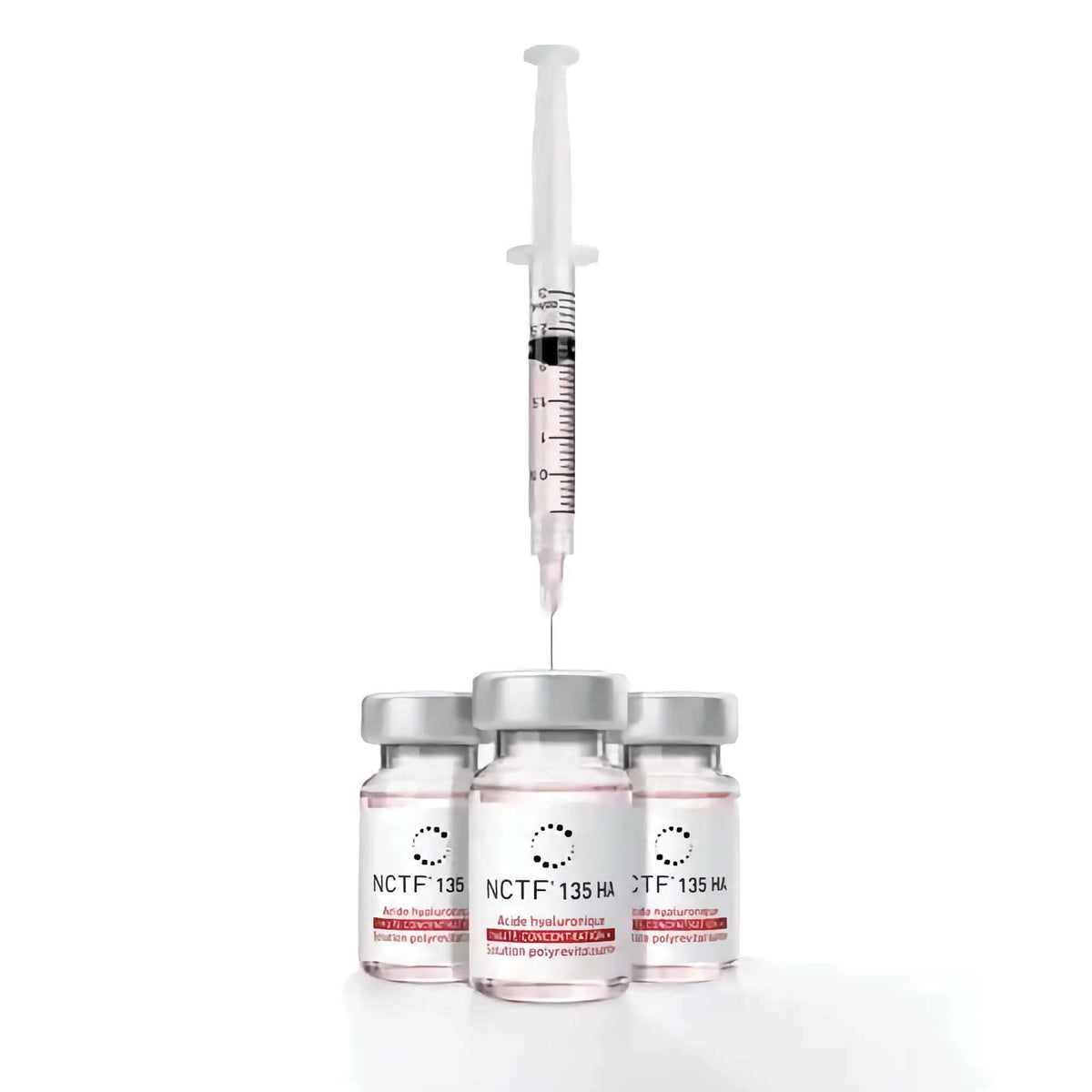 Fillmed NCTF 135HA 5 x 3 ml with a syringe over glass vials, showing advanced skin revitalization.