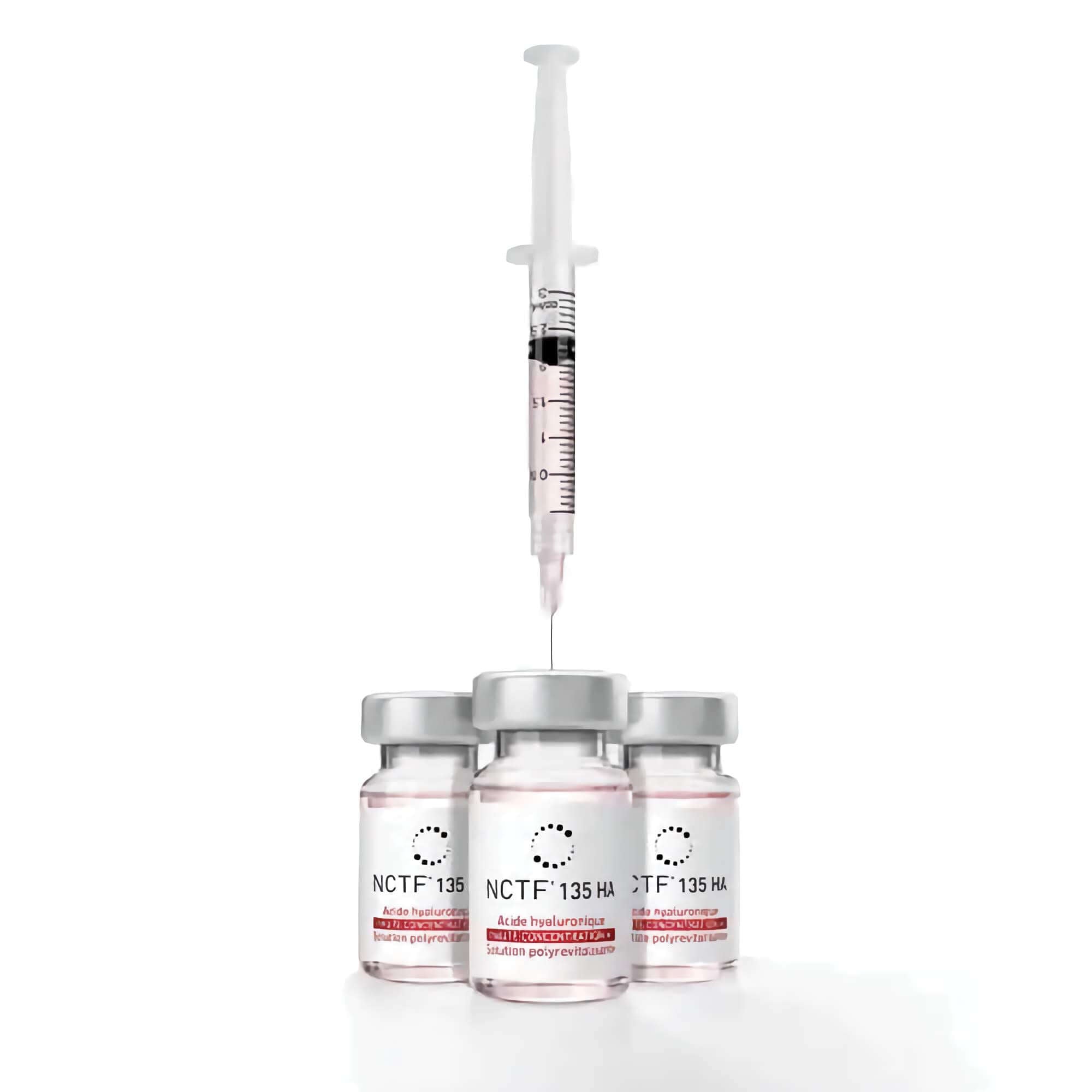 Fillmed NCTF 135HA 5 x 3 ml with a syringe over glass vials, showing advanced skin revitalization.