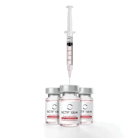 Fillmed NCTF 135HA 5 x 3 ml with a syringe over glass vials, showing advanced skin revitalization.